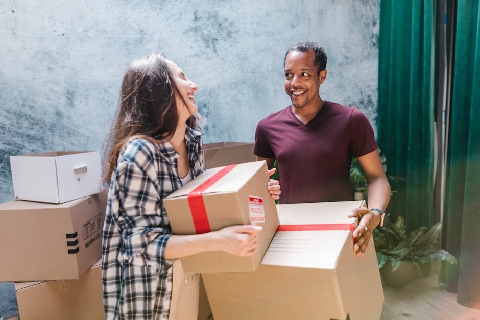 pexels-photo-7464495-7464495 Happy couple moving boxes into their new home, creating fresh memories together.